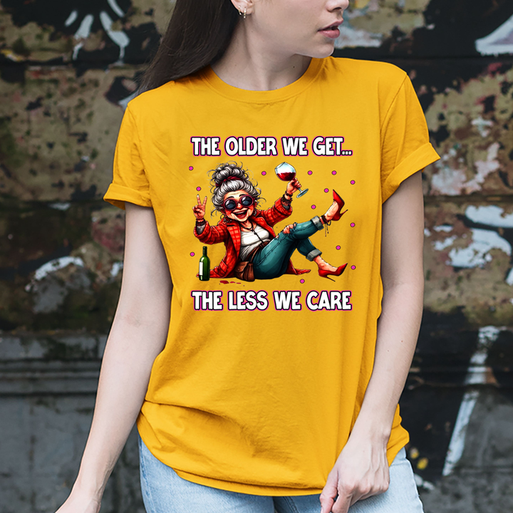The Older We Get.. The Less We Care  - T-Shirt