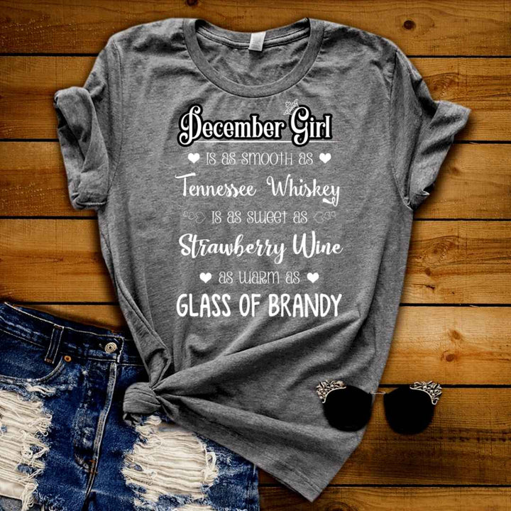 "December Girl Is As Smooth As Whiskey.........As Warm As Brandy"