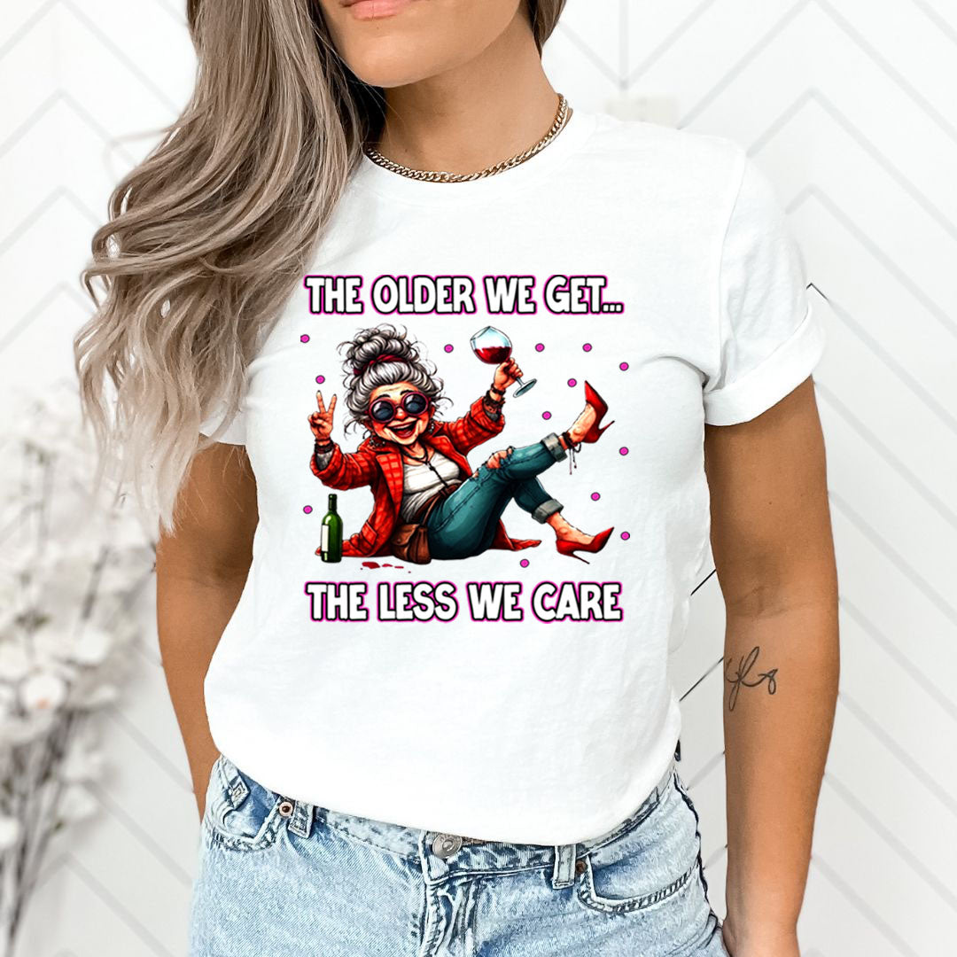 The Older We Get.. The Less We Care  - T-Shirt