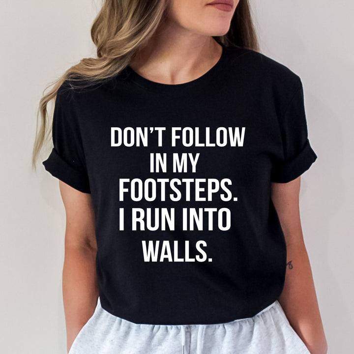 "Don't Follow In My Footsteps" - Bella Canvas T-Shirt